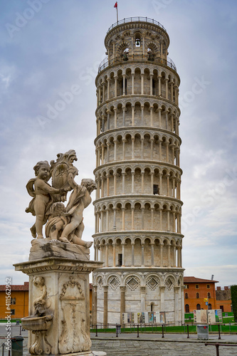 Fontana dei Putti with the Leaning Tower of Pisa in the Piazza dei Miracoli Tuscany Italy