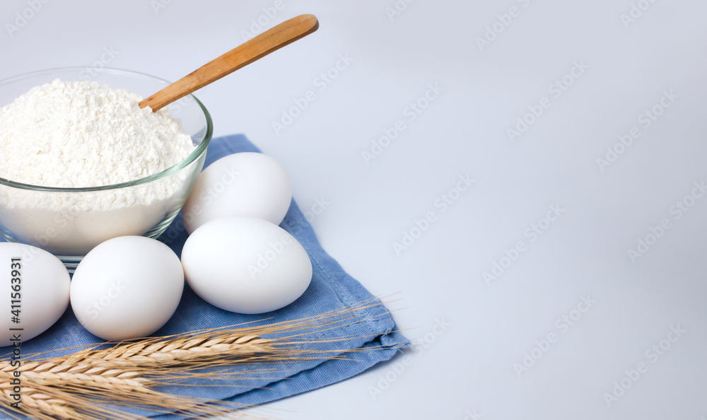Ingredients for dough: flour and eggs. Cooking process. Close-up. Copy space. Ingredients for dough: flour and eggs. Cooking process. Close-up. Copy space.