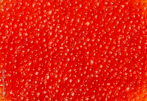 Red caviar background texture close-up copy space