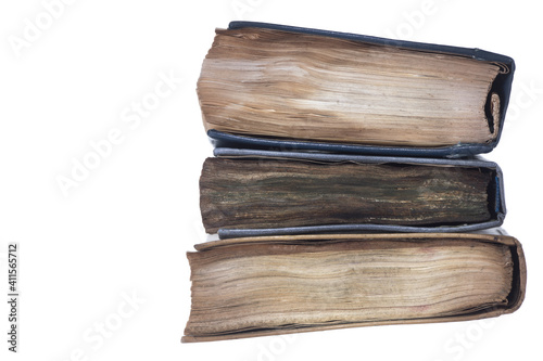 stack of old ancient books isolated on white background