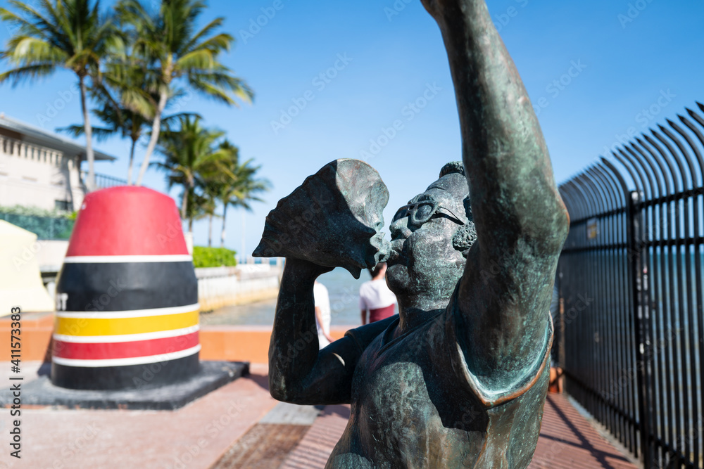 Key West, FL, USA JUNE, 2020 Statue of the ConchBlowing Greeter. Albert Kee goodwill