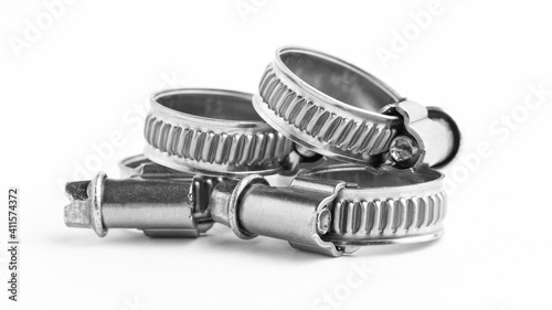 Different metal clamps for hose connection isolated on white background close up
