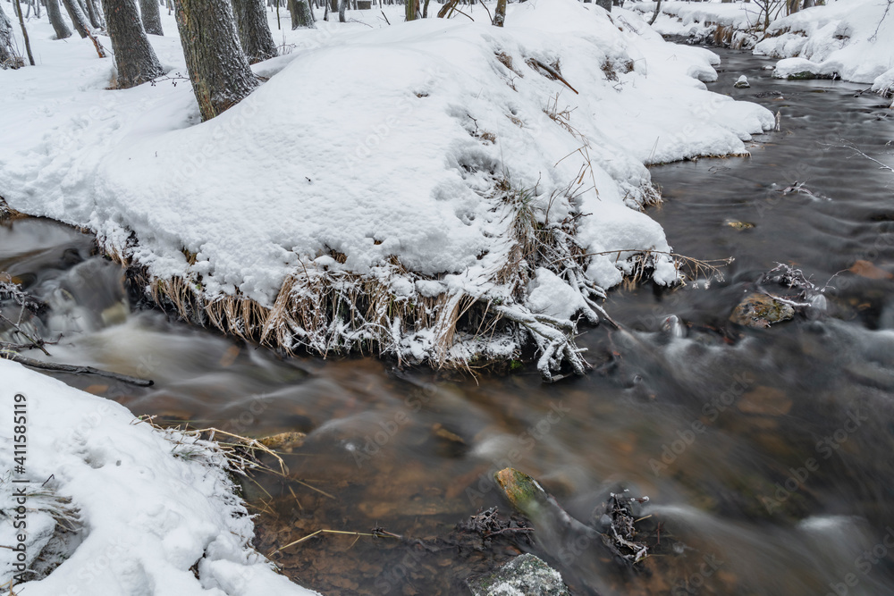 Fototapeta premium Olsovy creek near Petrovice village in Krusne mountains in winter cold morning