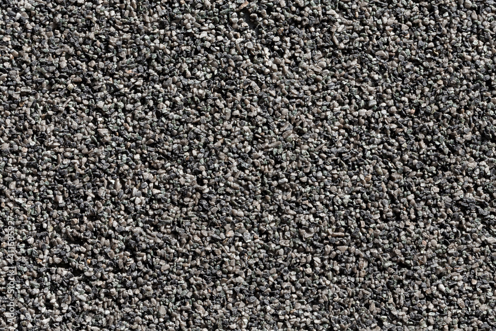 Crushed granite stones wall - close up Crushed granite stones wall - close up