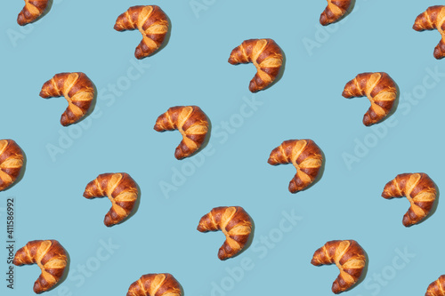 Croissant pattern on blue background