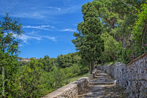 Steps leading to Villa Jovis in Capri. The ruins of Villa Jovis built by emperor Tiberius is located at the edge of a tall cliff on the island of Capri, Tyrrhenian sea, Italy