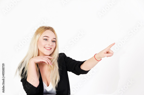 Studio portrait of blonde girl isolated on white background.