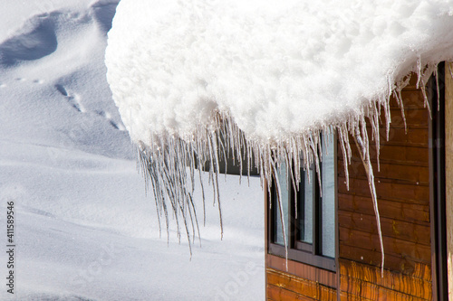 Ski resort, snowy mountains and hostels.