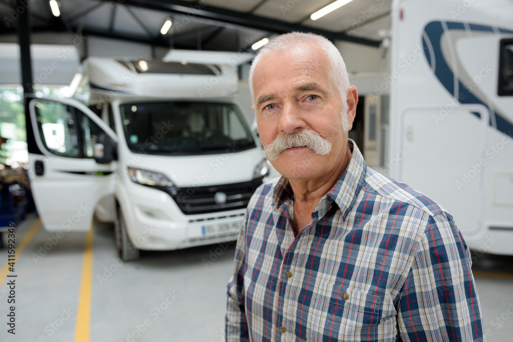 Fotografie, Obraz portrait of senior man in campervan garage
