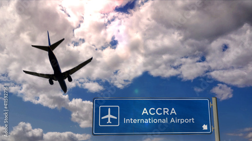 Plane landing in Accra Ghana airport with signboard