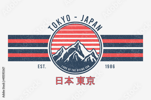 Tokyo, Japan t-shirt design with mountains and sun. Tee shirt graphics print with stripes, grunge and inscription in Japanese with the translation: Japan, Tokyo. Vector illustration.
