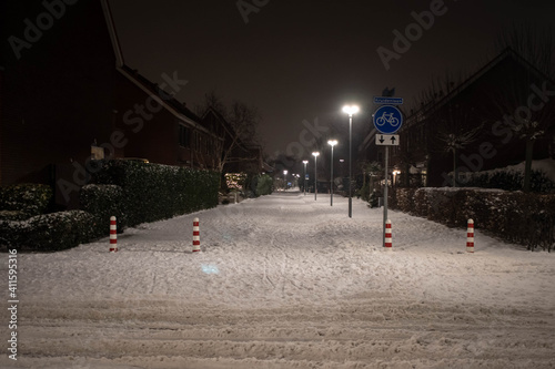 Dutch suburb on a snowy night during second lockdown after curfew (February, 2021)