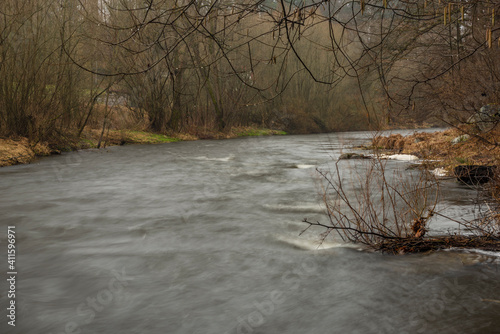 Malse river with melting of snow in south Bohemia mountains photo