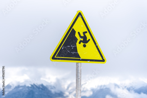 warning sign on the snow