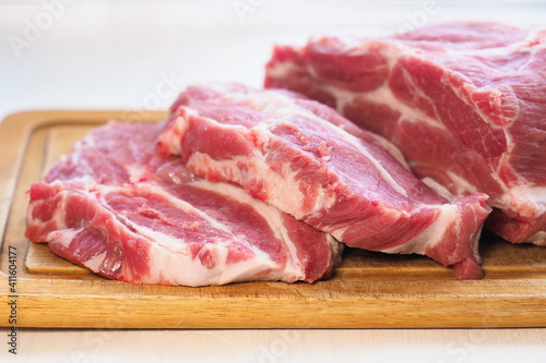 Fresh raw beef cut on a cutting board