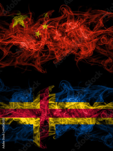 China, Chinese vs Aland, Alandic smoky mystic flags placed side by side. Thick colored silky abstract smoke flags.