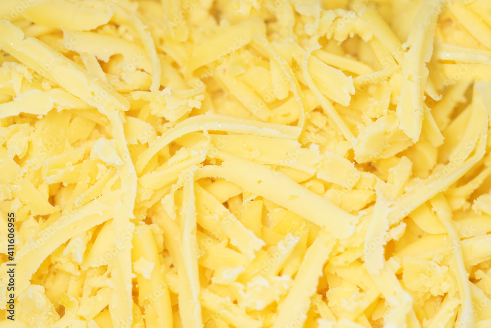 Grated cheese for a background. Cheese texture Grated cheese for a background. Cheese texture