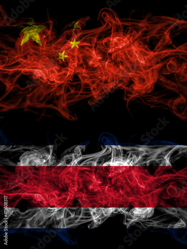 China, Chinese vs Costa Rica smoky mystic flags placed side by side. Thick colored silky abstract smoke flags.