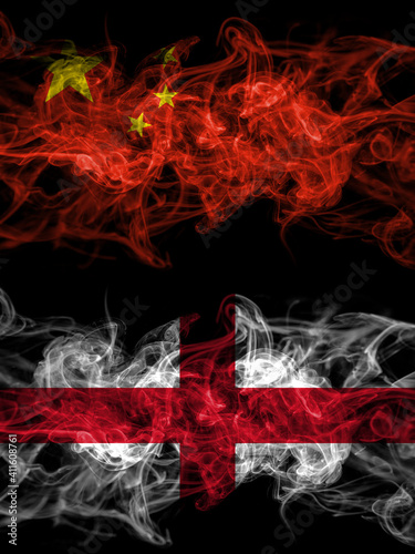 China, Chinese vs England, English smoky mystic flags placed side by side. Thick colored silky abstract smoke flags.