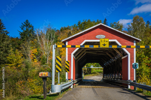 The red covered bridge of St Mathieu, near Mauricie National Park (Quebec, Canada)