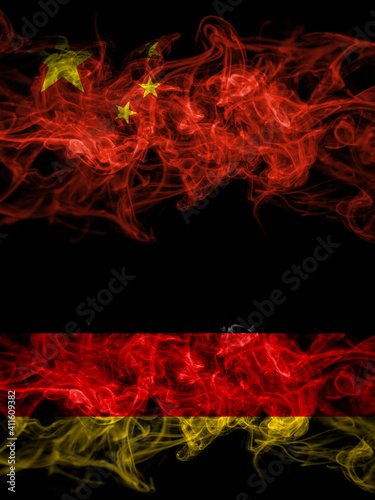 China, Chinese vs Germany, German, Deutschland smoky mystic flags placed side by side. Thick colored silky abstract smoke flags.