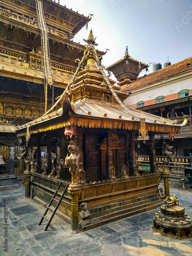 Hinduism Golden Temple (also known as Hiranya Varna Mahabihar) in Patan (Lalitpur), Nepal. The temple was built in the 12th century. Religious architecture theme. photo