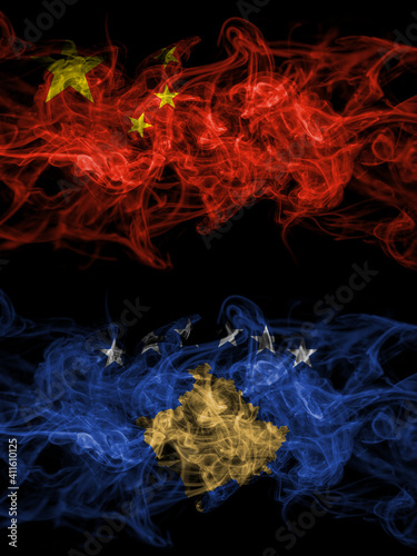 China, Chinese vs Kosovo, Kosovar smoky mystic flags placed side by side. Thick colored silky abstract smoke flags.