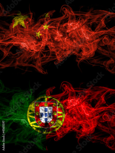 China  Chinese vs Portugal  Portuguese smoky mystic flags placed side by side. Thick colored silky abstract smoke flags.