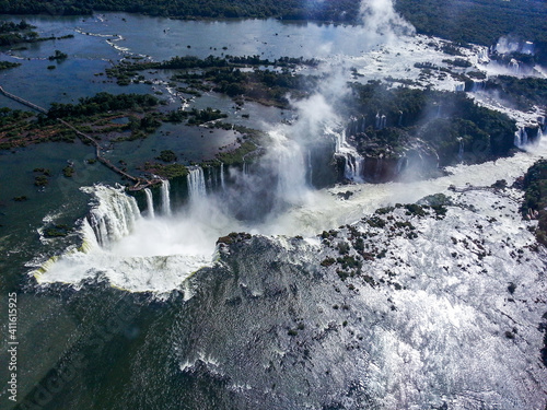 Fototapeta Naklejka Na Ścianę i Meble -  Amazing Iguazu Falls. A natural wonder located on the border of Brazil and Argentina. The view from the helicopter