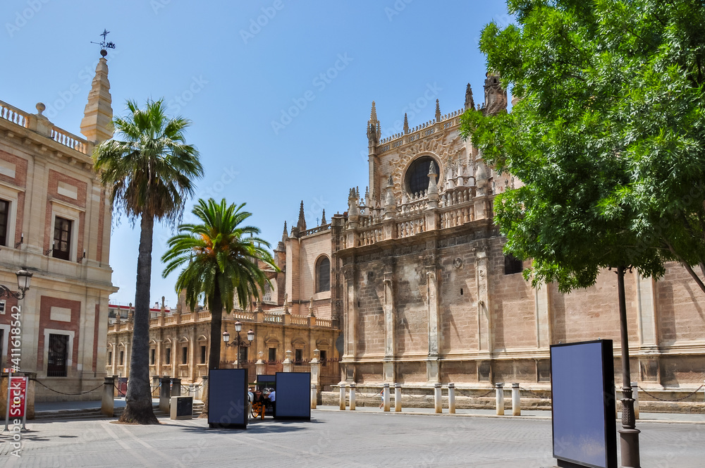 Archive Of The Indies (Archivo General de Indias) and Seville cathedral on Triumph square, Spain