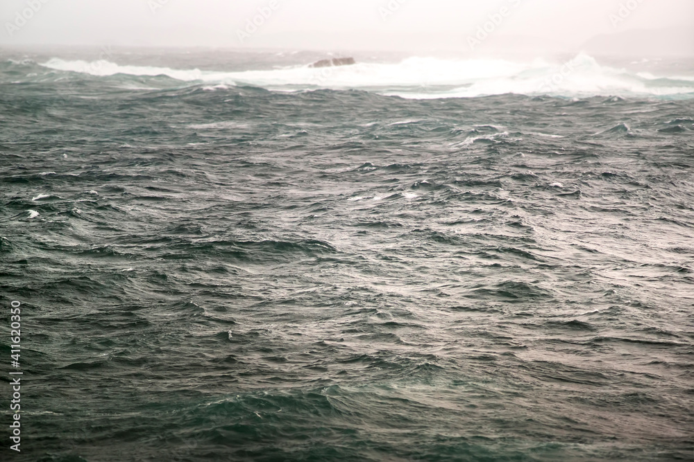 Fototapeta premium big ocean waves breaking in atlantic ocean coast during sea storm 