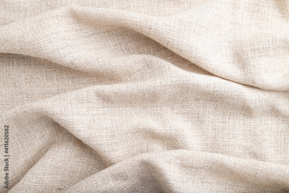 Fragment of white linen tissue. Side view, natural textile background. Fragment of white linen tissue. Side view, natural textile background.