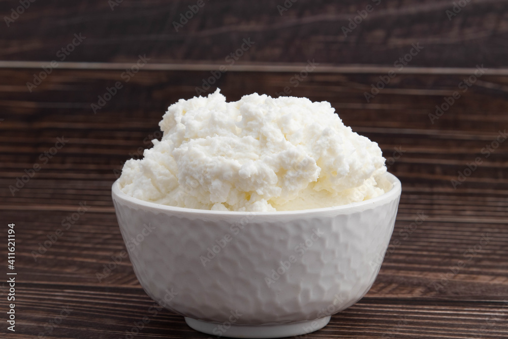Natural Ayurvedic Freshly Churned White Butter Also Known As Safed Makhan Malai Or Makkhan Is Used For Skincare As Beauty Product And Has Multiple Health Benefits. Wooden Background With Copy Space Natural Ayurvedic Freshly Churned White Butter Also Known As Safed Makhan Malai Or Makkhan Is Used For Skincare As Beauty Product And Has Multiple Health Benefits. Wooden Background With Copy Space