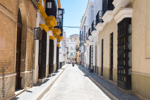 beautoful street of sanlucar de barrameda andalusian town, Spain photo