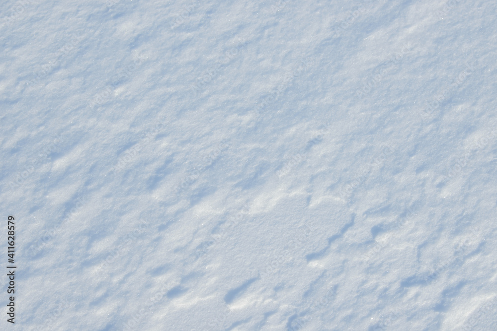 Fresh clean white snow background texture. Winter background with frozen snowflakes and snow mounds. Snow lumps. Seasonal landscape details. Cold weather. Fresh clean white snow background texture. Winter background with frozen snowflakes and snow mounds. Snow lumps. Seasonal landscape details. Cold weather.