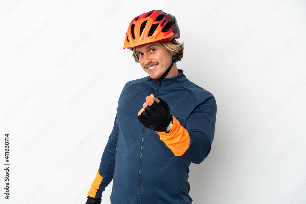 Young blonde cyclist man isolated on white background making money gesture Young blonde cyclist man isolated on white background making money gesture