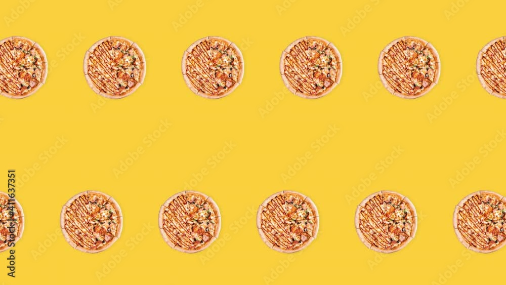 seamless looping animation with two rows of pepperoni whole pizzas on a yellow background, fast food concept for advertising with copy space