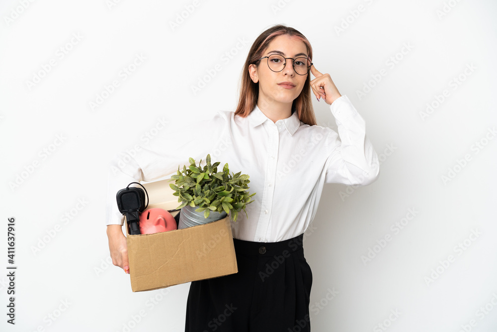 Young caucasian woman moving in new home among boxes isolated on white background having doubts and thinking Young caucasian woman moving in new home among boxes isolated on white background having doubts and thinking