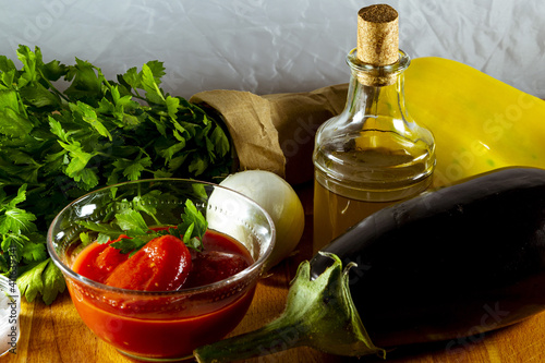 Closeup shot of fresh organic ingredients for healthy cooking or salad making photo