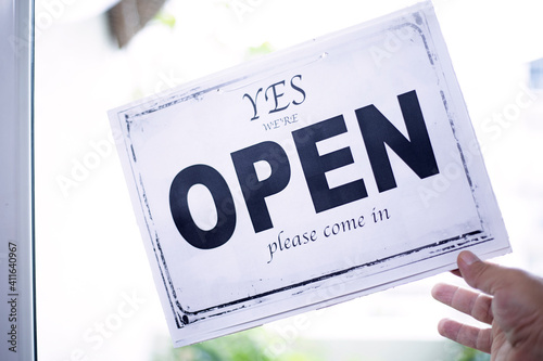 open closed signboard at cafe door window
