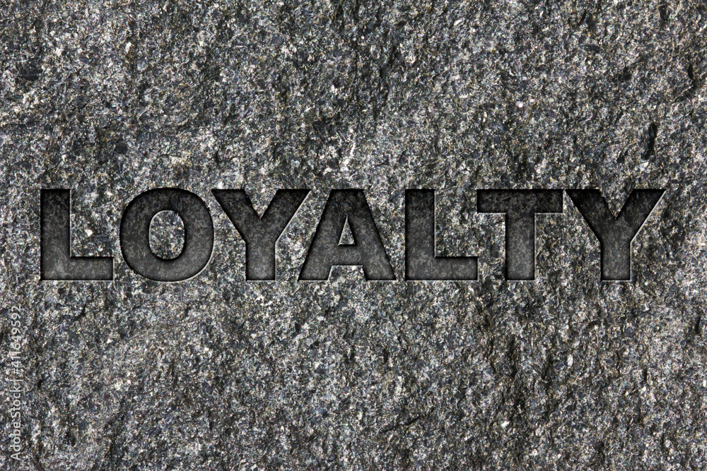 Loyalty etched in bold, dark gray text on black granite. Loyalty etched in bold, dark gray text on black granite.