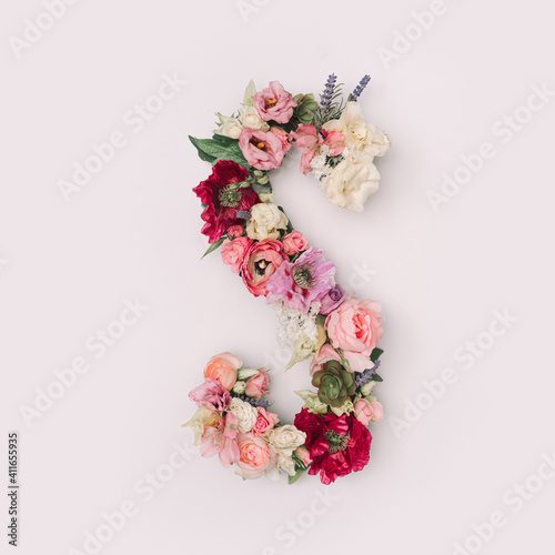 Letter S made of real natural flowers and leaves. Flower font concept. Unique collection of letters and numbers. Spring, summer and valentines creative idea. © Zamurovic Brothers