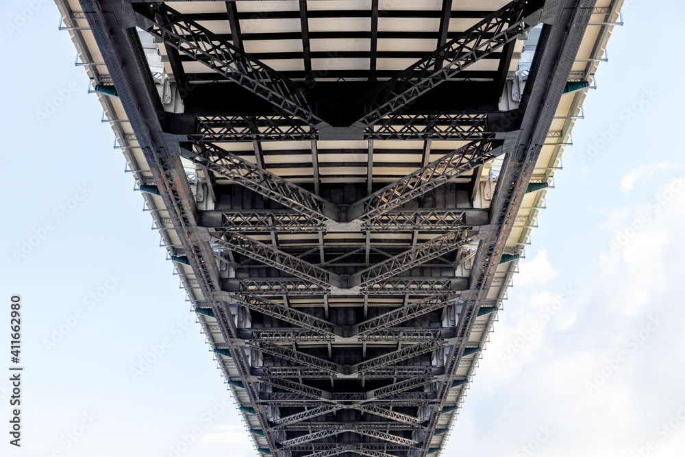 Ab abstract  shot of the underneath  of the Story bridge crossing over the Brisbane river on a sunny day in Brisbane City Queensland on January 31st 2021
