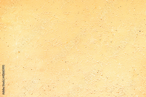 light yellow golden grunge textured background. Sandstone vintage wall