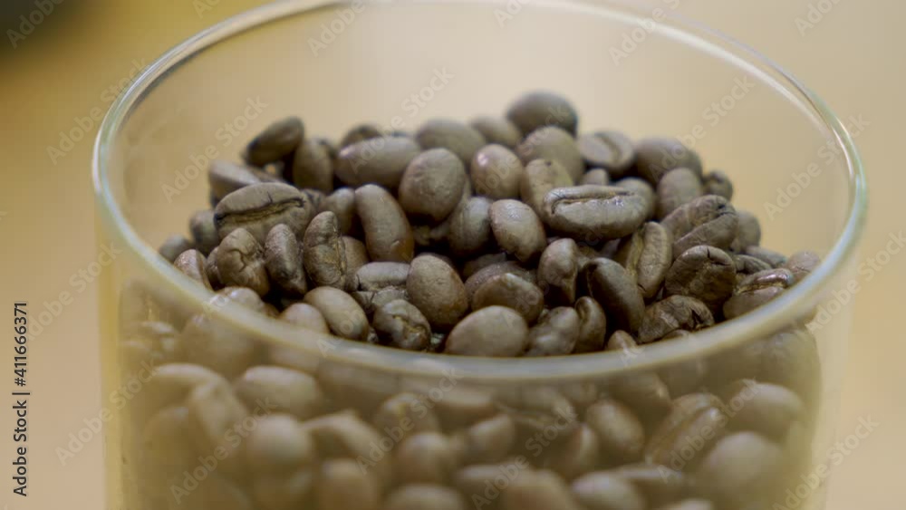 Scoop coffee beans with wooden spoon, soft focus, 4K Scoop coffee beans with wooden spoon, soft focus, 4K