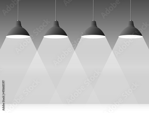 Light dark background with four black chandeliers
