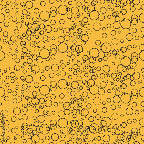 Seamless vector pattern with a lot of gray little bubbles on a yellow backgrouns. Print for packaging design, fabric, textile, wrapping paper