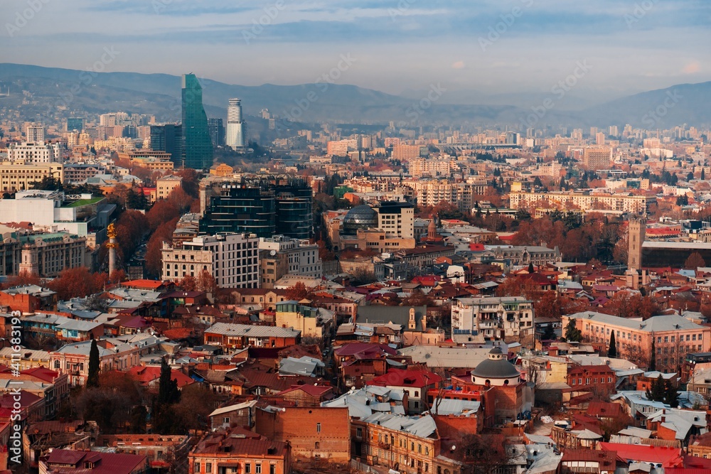 Naklejka premium Top view of the center of Tbilisi. Old red roofs and local landmarks in Georgia.