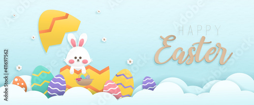 Happy easter day card design color pastel background wallpaper paper art style with bunny holding basket and eggs vector illustration.