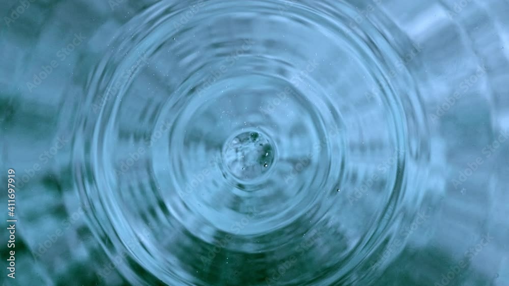 Super Slow Motion of Water Droplet at 1000fps. Top Down View.